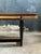 Stunning Italian art deco dining table in the style of Osvaldo Borsani. Bold sculptural design in the black lacquered fin...