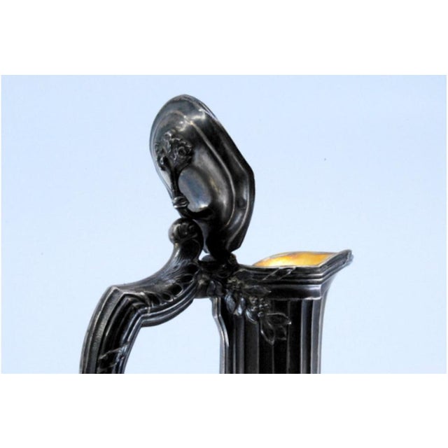 Wine Jug in Cut Glass and Silver on the Lid, Neck, Handle and Base with Reliefs, in Very Good conditions. Designed before...