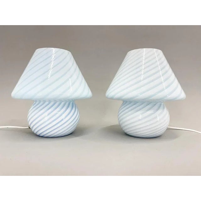 Set of two Murano glass table lamps atributed to Paolo Venini. Produced in Italy in the 1970s. New wiring, bulb: E 14 This...