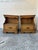 Pair of vintage American-style nightstands constructed from maple wood and features decorative carved details on the base....