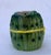 This folk art ceramic pitcher is cleverly disguised as bunch of asparagus tied together with a yellow ribbon. The...
