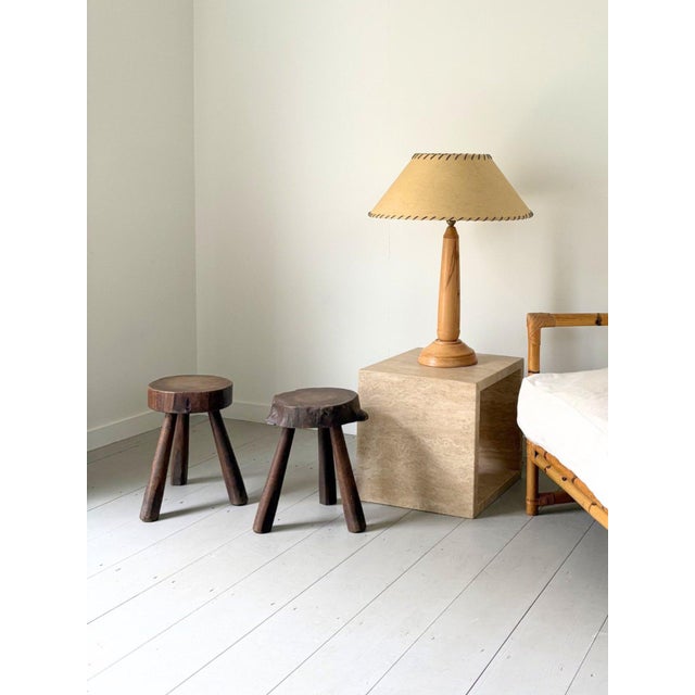 A wonderful handmade vintage slab stool with chunky, generous proportions. This rustic wooden side table stool is a french...