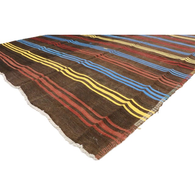 Vintage Turkish Kilim Rug with Colorful Bayadere Stripes and Modern Cabin Style. Create a comfortable and modern setting...