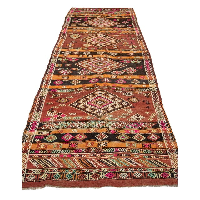 Handwoven vintage embroidered kilim rug from Denizli region of Turkey. Approximately 55-65 years old. In very good condition.