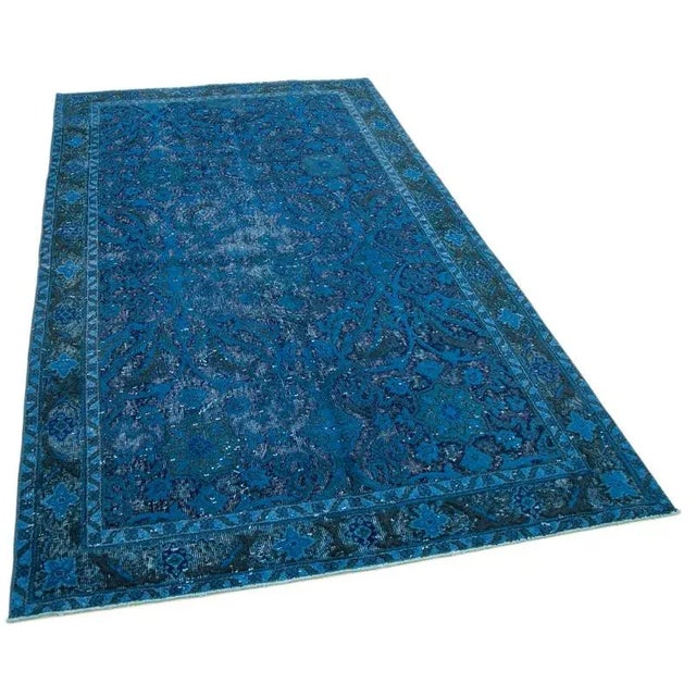 Explore our Hand-carved Over-dyed rugs, where vintage hand-knotted Turkish rugs from the 60s and 70s are given new life....