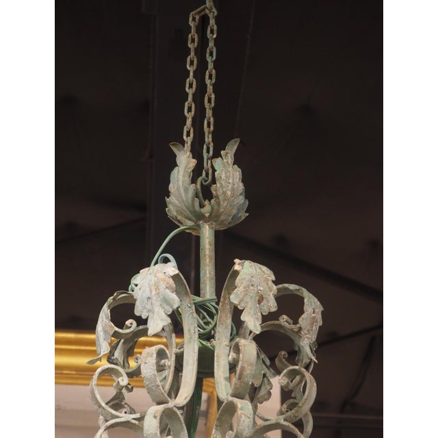 More information coming soon… The vert patine of this French chandelier is well done, giving the scrolled wrought iron a...