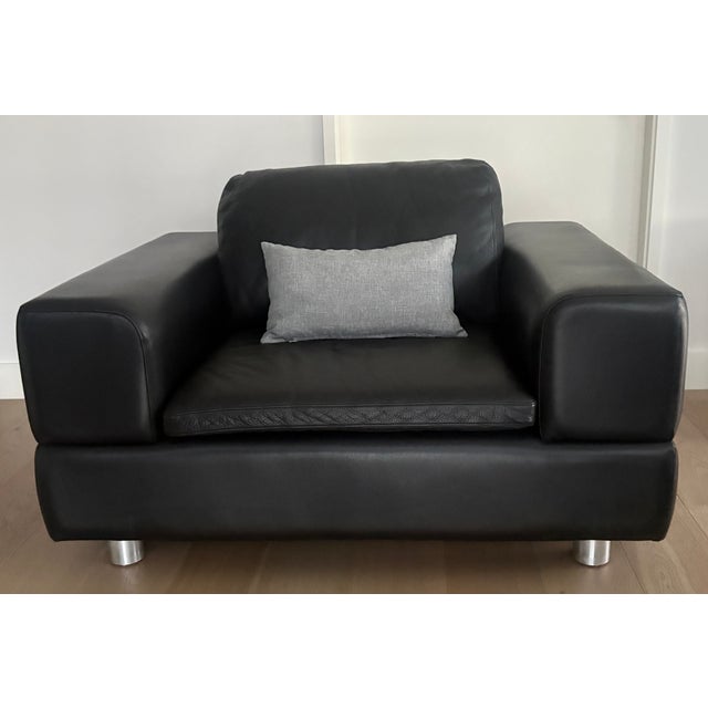 Custom-made American Leather armchair built for comfort and longevity. This piece has been a staple in our home for many...