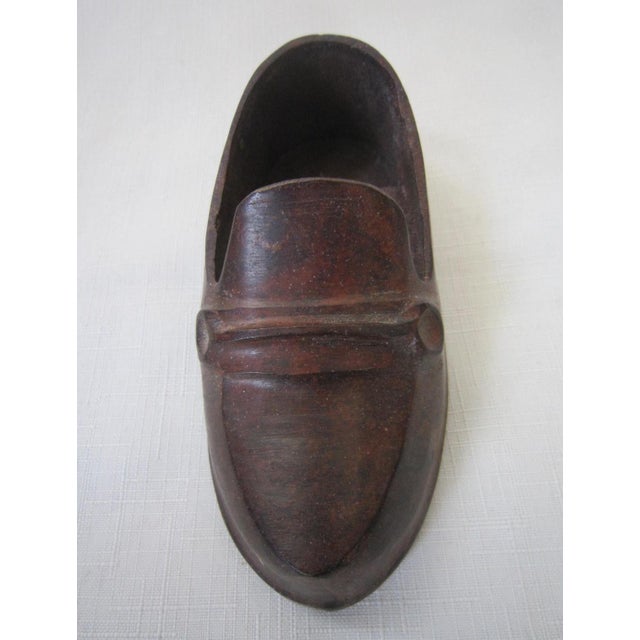 Charming Collectable Bronze shoe in the shape of a Loafer. Great little desk accessory, it measures 4"L x 2.5"W x .75"H...