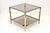 Beautiful late mid century Italian brass side table from the period around 1970. This two-tier Hollywood regency style...