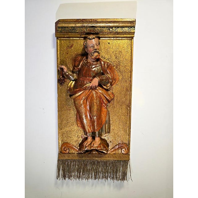 Rare and finely detailed pair of polychrome painted and carved wood reliefs, likely from Valladolid, Spain, dating to the...