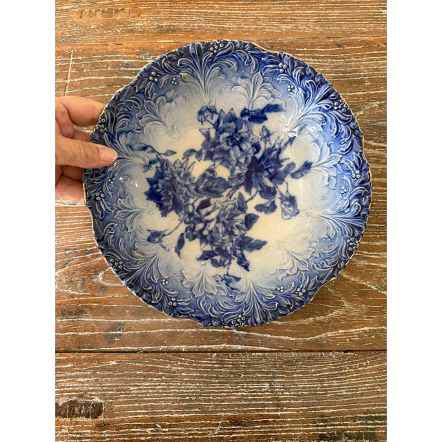 A beautiful collection of two antique Flow Blue serving bowls, each featuring the wonderfully blurred cobalt decoration...