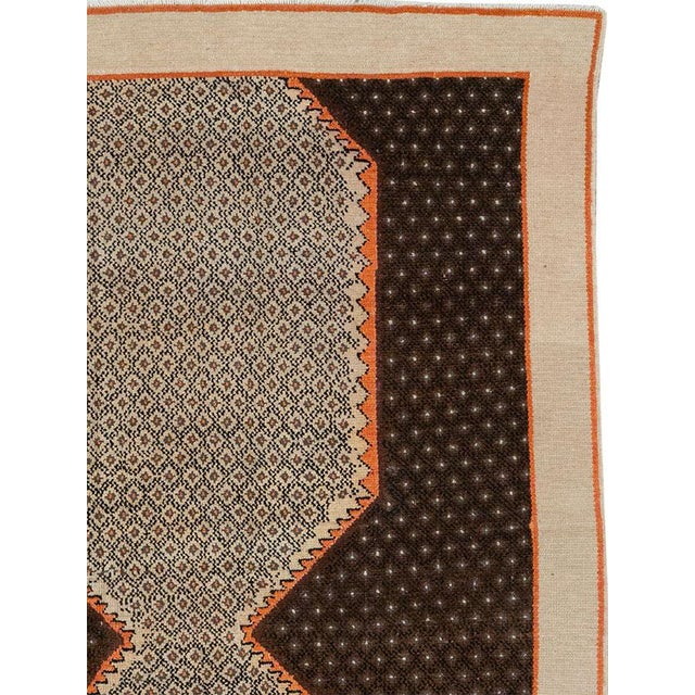 A wool pile of symmetric knots on a cotton foundation. A tiny diamond lattice with central pinpoints pervades both the...