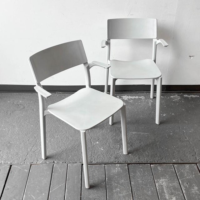 Product. Pair of armrest chairs style. Vintage manufacturer. Ikea materials. Polypropylene · light gray tone equipment....