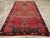 A vintage Turkish Anatolian long room size carpet handmade during the Mid-20th Century. Measures: 8' 3" x 14' 10".