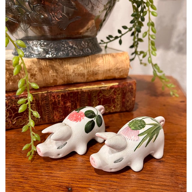 Imported from England. Pair of Plichta floral hand painted pigs. Plichta pigs are highly collectible ceramic figurines...