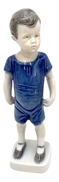 Porcelain Figurine of a Boy from Royal Copenhagen, Denmark
