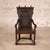 This 17th Century English Oak Gothic Carved Chair is a rare and historically significant antique, showcasing the bold...