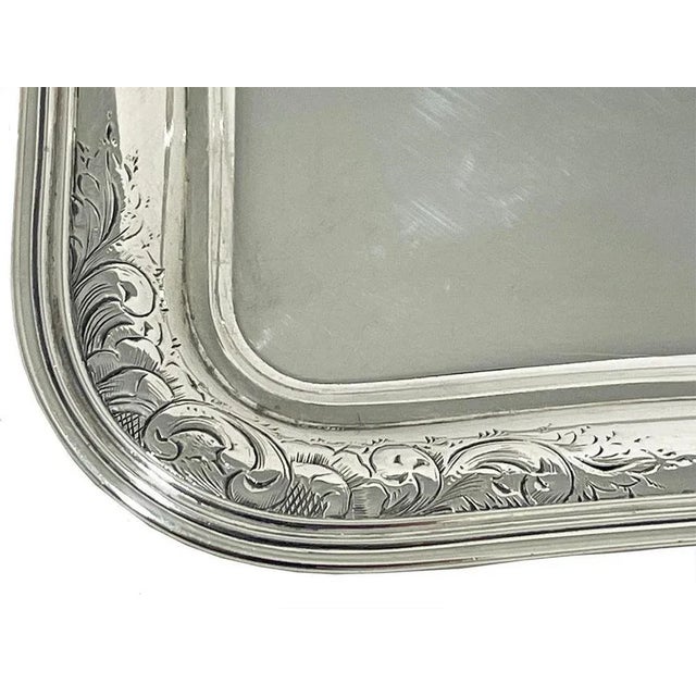 A dutch silver salver by george reevers, 1856 a silver rectangular salver with round shapes, made by the silversmith...
