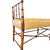A fantastic 1960s French Regency style faux bamboo bench featuring elegant turned wood faux-bamboo joinery, delicate...