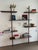 The Ketch bookcase features a sleek steel frame with brass lacquered finish, offering a modern, architectural look. Its...