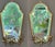 Pair of 20th C. Italian giltwood mirrored sconces, the shaped arched plates with beveled borders, each etched with a...