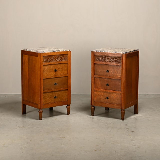 Elegant pair of Art Nouveau/Art Deco bedside tables, side tables, or chests of drawers, France, 1930s. Oak cabinets with 3...