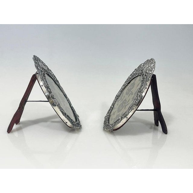 A set of dutch silver photo frames by gebr. Niekerk, b. Dijkstra, groningen, 1915 a set of dutch silver oval photo frames...