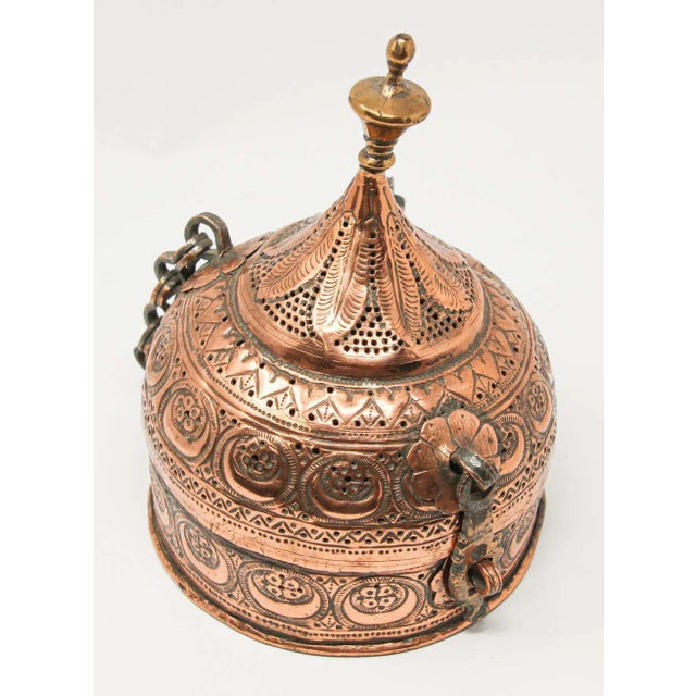 Antique Indian Mughal Revival Copper Lidded Box, Repoussé and Pierced Metalwork An elaborately decorated antique Indian...