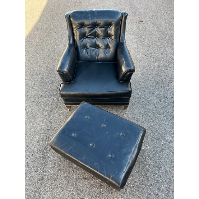 Brass Nail Head Trim Tufted Back Two wheels on front of chair Good condition, normal wear Brand new black vinyl cushion,...