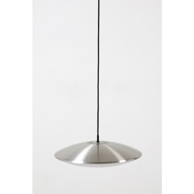 Designed by Jo Hammerborg for Fog & Mørup in 1965, the Diskos pendant is an exceptionally clean expression of Danish...