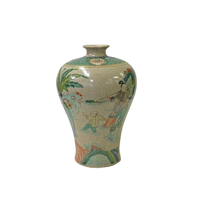 This exquisite Chinese porcelain vase boasts a graceful beige crackle base adorned with a meticulously hand-painted...