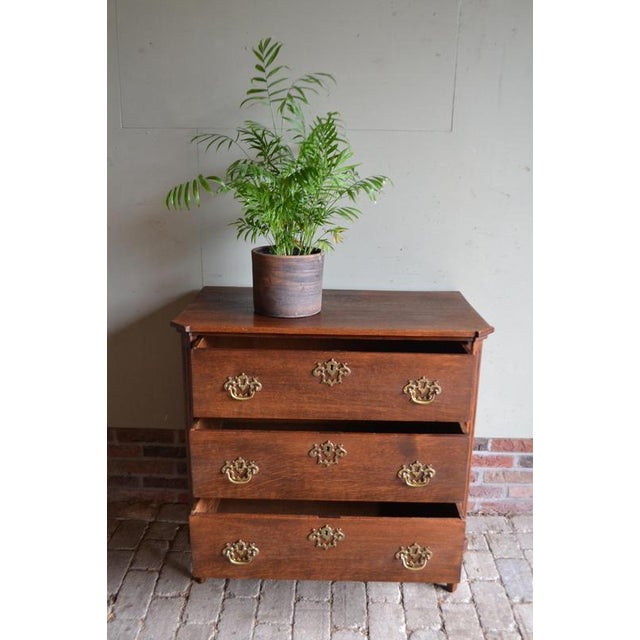 19th-century Dutch oak chest of drawers, sideboard, commode. The height is 83 cm. The width is 87 cm. The depth is 47 cm....