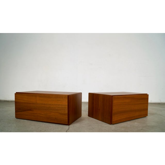 Pair of Midcentury Modern style walnut nightstands for sale. These are floating nightstands, and go fastened to the wall....