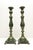 A pair of brass candlesticks with a faux green patina finish. Marked on the bottom with provenance reading Japan.