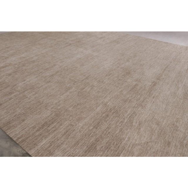Rug & Kilim’s Oversized Modern Textural Rug in Brown, White and Beige Striae Description: A 14x22 oversized bold new...