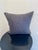This stylish throw pillow features a versatile dark gray, textured fabric that adds both comfort and modern sophistication...