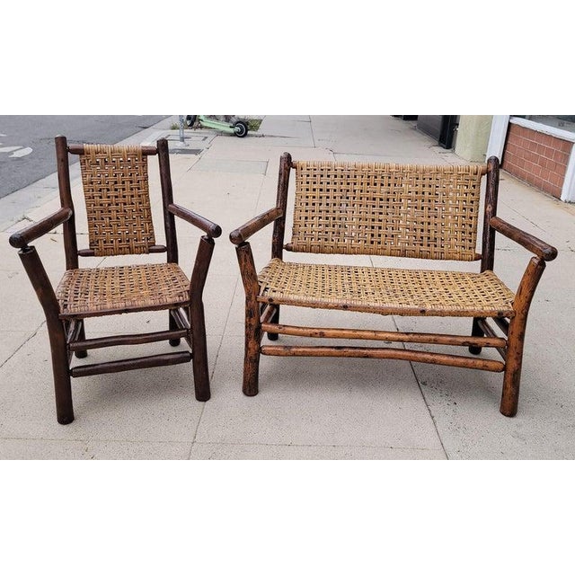 These Signed Old Hickory settee & side chairs are in fine condition and we are having both pieces protected from bad...