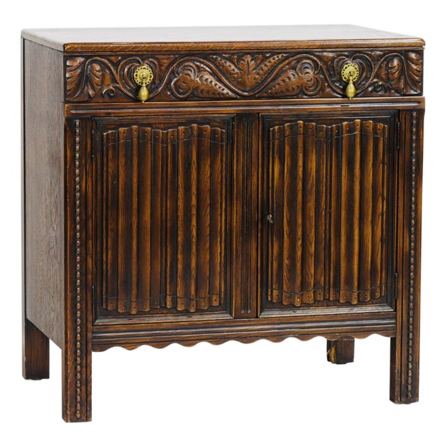Jacobean Revival Carved Oak Cabinet / Server – Paneled Doors, Frieze Drawer & Brass Pulls, England, C. 1920s For Sale