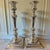 A striking and beautifully proportioned pair of oversized floor-standing silver-plated candlesticks, each rising an...