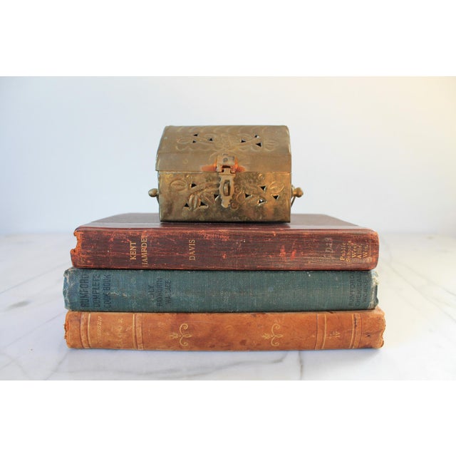 Vintage brass treasure box shaped cricket box. Made in India. Some patina & oxidation.
