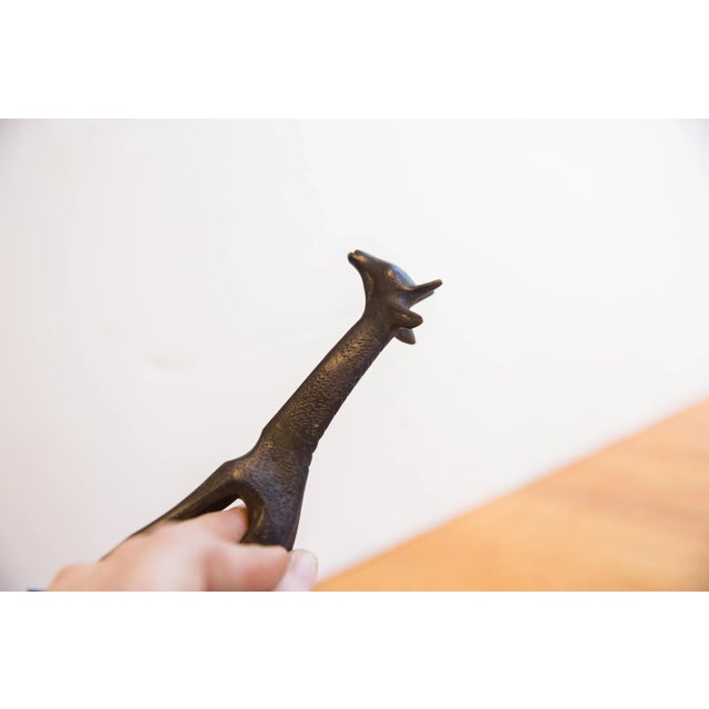 :: Vintage handmade African giraffe with dark patina. Circa 1960s though possibly older, this piece has such incredible...