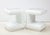 Pair of Ron Seff night stands / End table that are covered in white leather. The tables have mirrored tops framed by a...