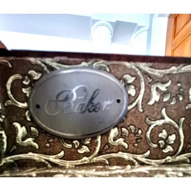 Beautiful high-quality Baker Furniture “Milling Road” single-drawer writing desk with elegant curved (C-scroll) legs. This...