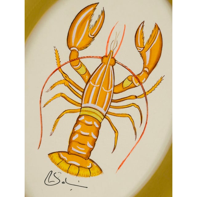 A joyful little lobster painting full of warmth, detail, and personality. Hand-painted in bright saffron tones and soft...