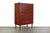 Tall teak dresser. All drawers slide easily. Two gorgeous attention demanding sculpted pulls on each drawer. ample storage...