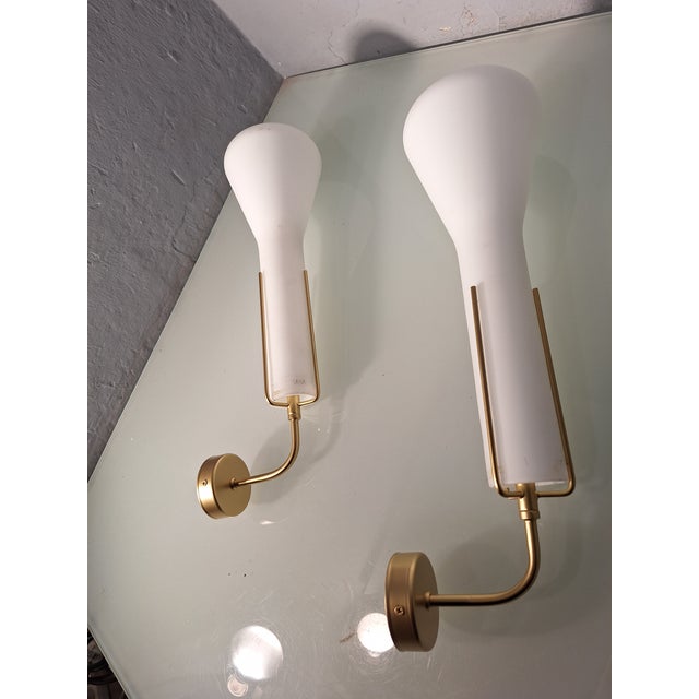 Wall Lamps in Brass and Glass in the style of Arredoluce, Set of 2, in Very Good conditions. Designed 1980 to 1989 This...