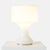 An opaque white hand blown glass Sebenica table lamp by Enrico Capuzzo for Vistosi. Italy, c. 1970 An opaque white hand...
