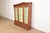 A gorgeous antique Eastlake Victorian triple bookcase cabinet or display cabinet In the manner of Herter Brothers USA,...