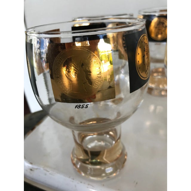 Vintage set of 8 Cera Glass beer glasses/goblets with gold and black antique coin decoration, designed by Bob Wallack in...