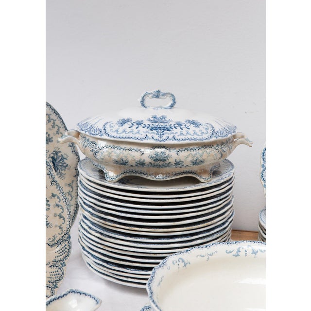 French dinnerware from the late 19th or early 20th century, one of the most sought-after designs from the Saint Amand...